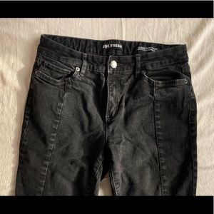 Black jeans with raw hem